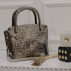 تحفة بتصميم شنطة فضي